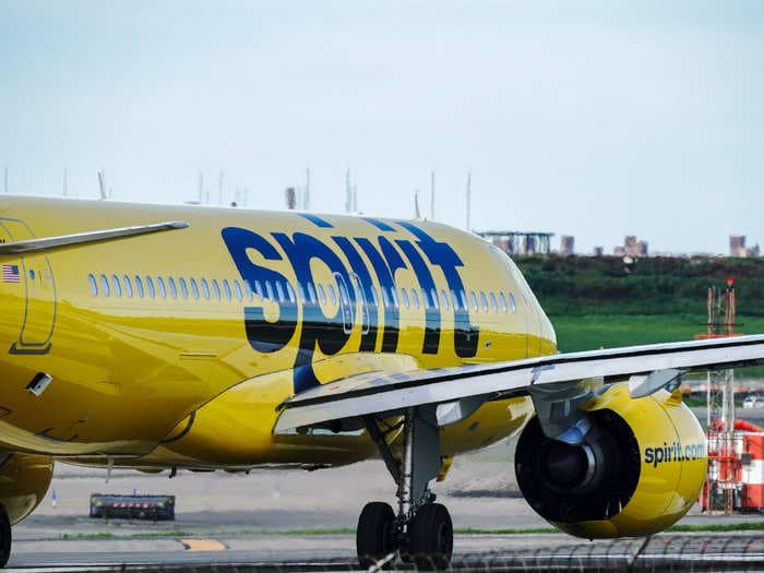Spirit Airlines plane catches fire in New Jersey after a large bird strikes one of its engines as it tries to take off
