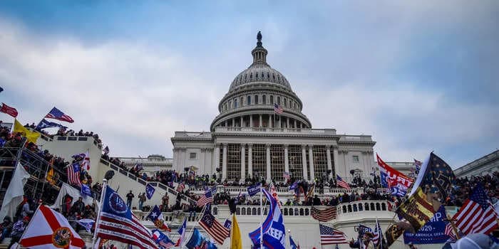 A Capitol riot suspect is being 'shunned' by people in her small Indiana town and 'chastised on the street,' lawyer says