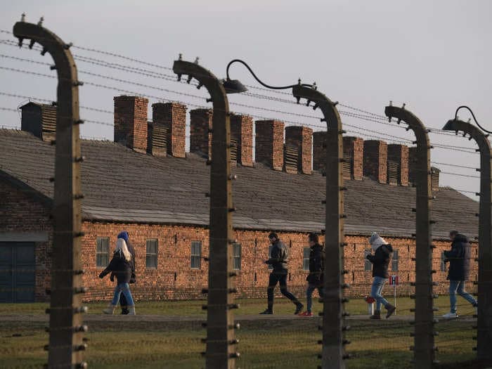 Auschwitz museum staff say anti-Semitic graffiti has been found in an 'outrageous attack' on the former concentration camp