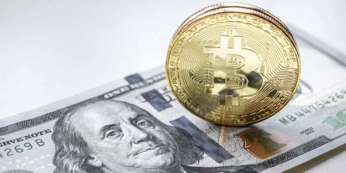 The rise of cryptocurrencies could challenge the dominance of the US dollar, new Fed paper says