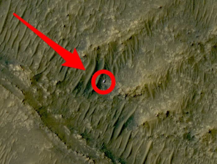 A NASA spacecraft orbiting Mars snapped a photo of the Perseverance rover in the crater below