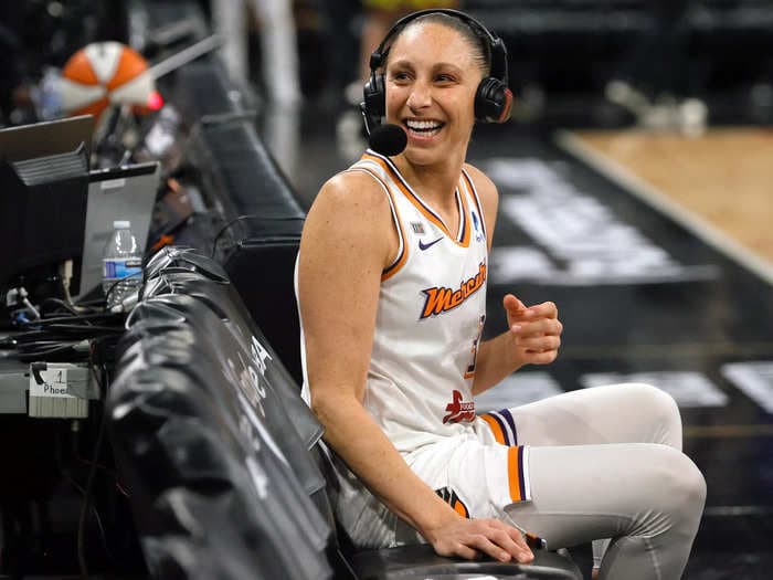 The WNBA GOAT told her very pregnant wife to 'hold it in, babe' on TV after epic comeback win for a spot in the WNBA Finals