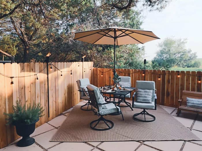 Lighting, fire pits, and heat lamps lead fall landscaping trends, according to one Lowe's exec