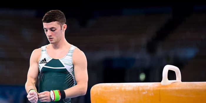 A top Irish gymnast blamed his poor performance on a slippery pommel horse that was wiped down after the competitor before him tested positive for COVID-19