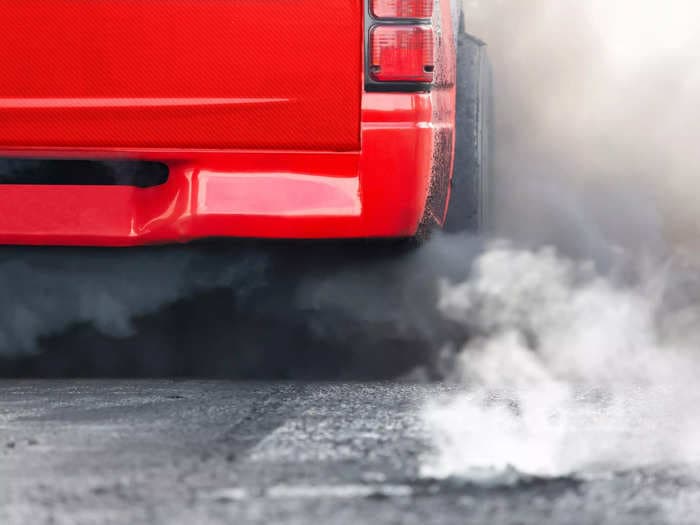 Video shows a truck 'rolling coal,' or purposefully blowing a cloud of thick black exhaust fumes, into a busy Texas restaurant