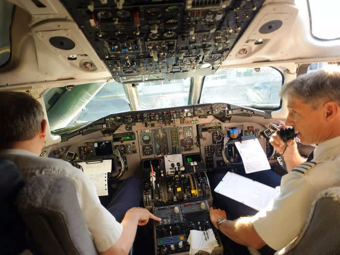 An airline pilot that's kicked passengers off planes for not wearing masks shares what goes on in the cockpit when passengers become unruly