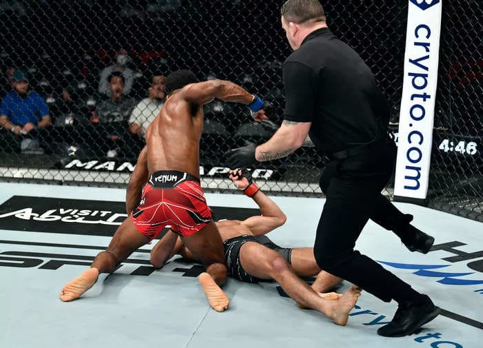 One photo shows how stunned commentators were when a UFC fighter landed a nasty knee strike knockout Saturday