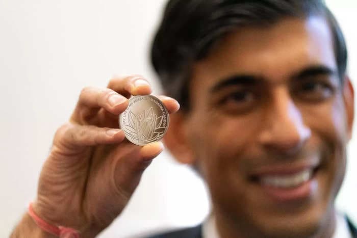 Britain's five-pound Diwali coin has Mahatma Gandhi's quote and a lotus