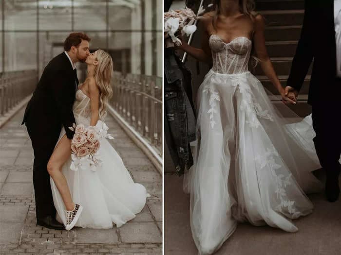 A bride wore a wedding dress with a see-through, corset bodice and a thigh-high slit