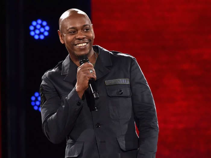 Dave Chappelle's high school alma mater postponed a fundraiser where he was set to appear after students threatened to walkout