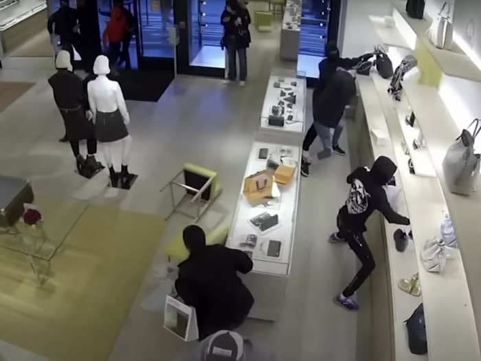 Chicago and Minneapolis become the latest victims in a series of smash-and-grab robberies at retailers across the US after a spree of Black Friday thefts