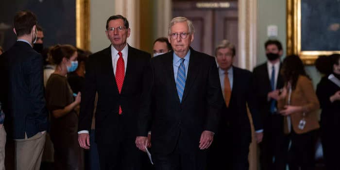 McConnell pushed back against the idea of a government shutdown to derail Biden's vaccine mandate, as threats by the GOP's right test his power