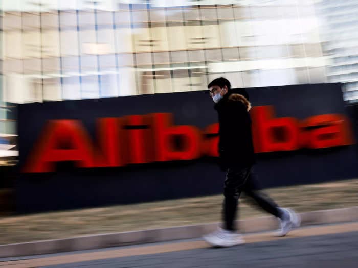 Alibaba shares slide in Hong Kong after it overhauls e-commerce businesses, appoints a new financial chief