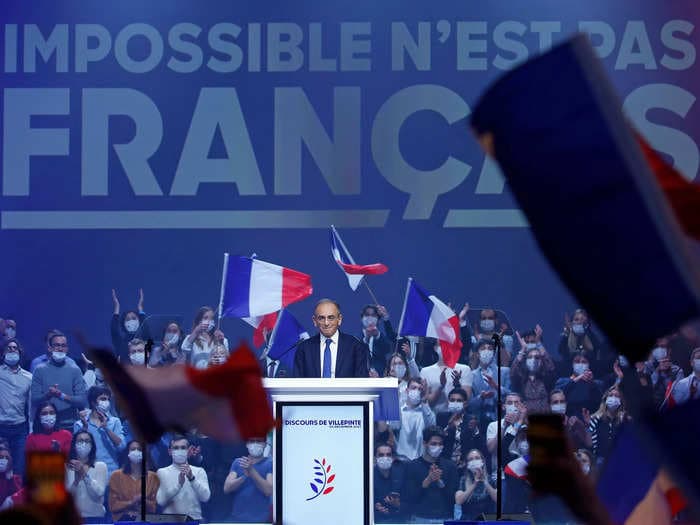 Video shows supporters of a French far-right presidential candidate throwing a chair at protesters during a rally