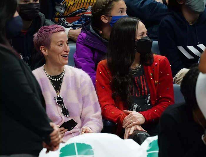 Megan Rapinoe acted as fiancée Sue Bird's personal photographer when she was honored at UConn's latest game