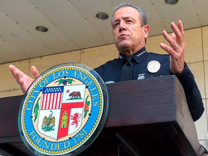 LAPD Chief Michel Moore's security detail is under investigation for wrongfully detaining a man during a trip to France