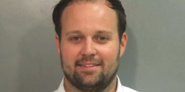 Josh Duggar smiles in new booking photo after being convicted of receiving and possessing child pornography