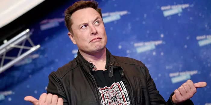 Elon Musk slams Warren Buffett's job as 'super boring' — but praises the investor's skills and defends his $100 billion fortune