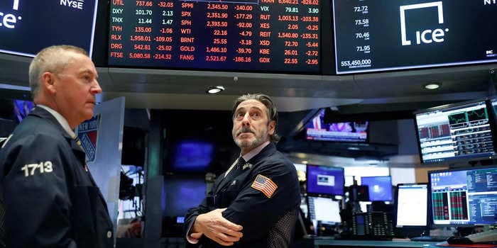 Dow drops 433 points as COVID-19 cases climb and Manchin sinks social spending bill