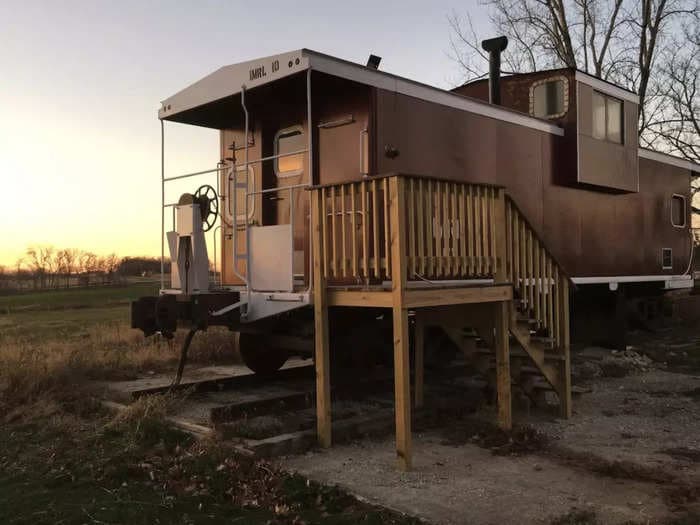 A father and daughter transformed a 1973 train caboose into an Airbnb — take a look inside