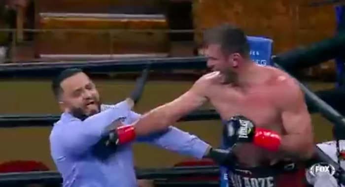 A boxer went rogue and punched the referee in feral scenes that followed a fight featuring 5 knockdowns