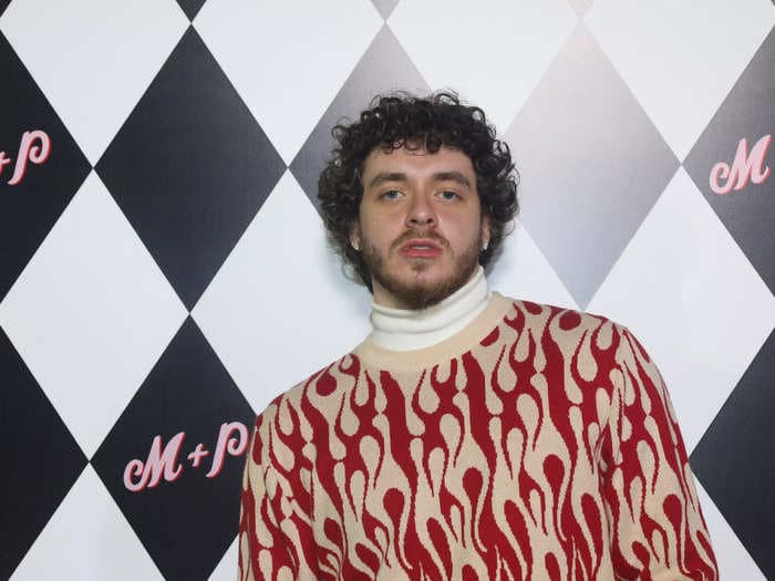 Rapper Jack Harlow is praised for defending Black women after a viral video of an officer clutching a fan's neck