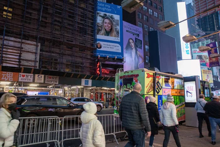 A mom with stage 4 cancer put up a Times Square billboard reading 'Date my daughter' to help find her perfect match