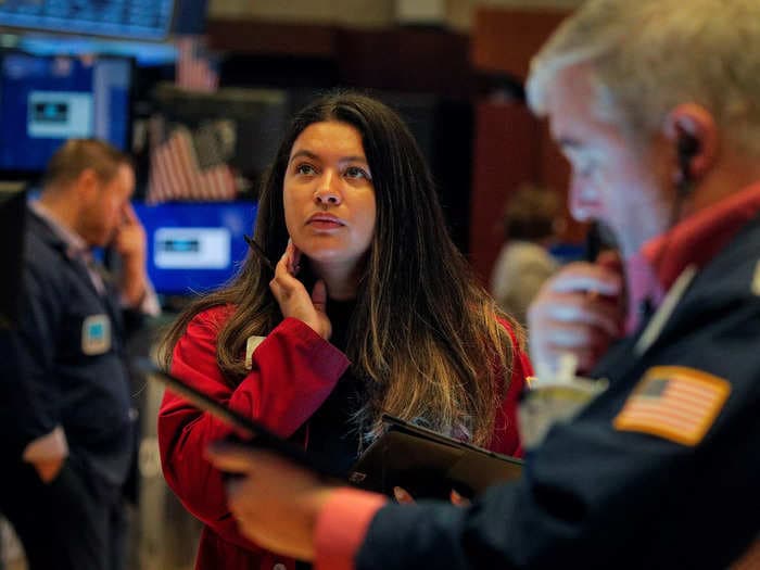 US stocks end volatile session lower as impact of Fed rate hikes outweighs strong GDP growth