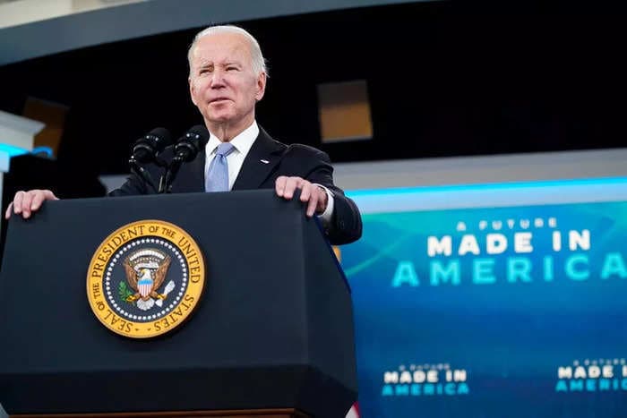 Biden notes Tesla is the country's 'largest electric-vehicle manufacturer' after Elon Musk called him a 'damp sock puppet in human form'