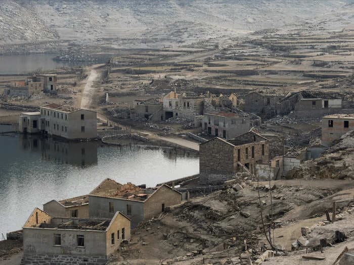 This Spanish ghost village was underwater for 30 years. Photos show the ruins that emerged due to drought.