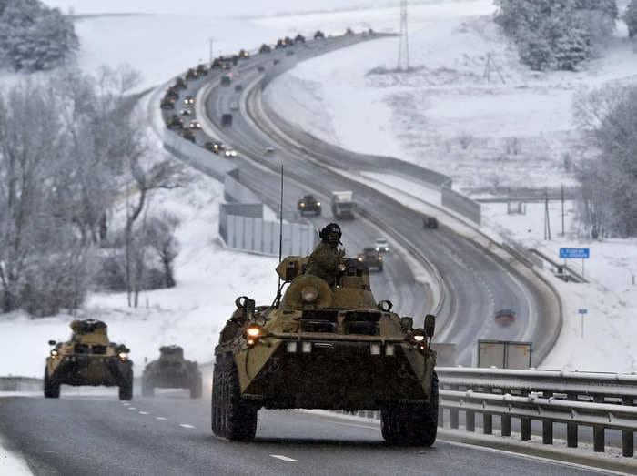 Russia says it is pulling back some of its troops from the Ukrainian border