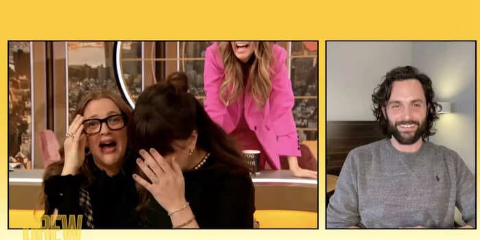 Drew Barrymore flipped out and dived over her desk after 'You' star Penn Badgley made a surprise appearance on her talk show