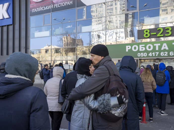 Citizens in Kyiv emerge from shelters to queue at grocery stores after curfew ends