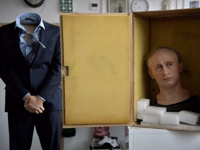 Photos show a wax figurine of Vladimir Putin being dismantled piece by piece in a Paris museum after the Russian invasion of Ukraine