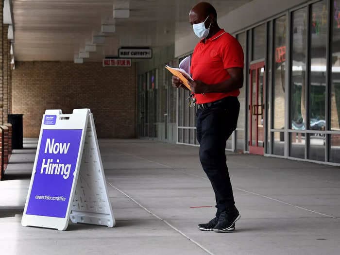 As jobs boomed, wages stayed flat in February — and some low-wage jobs saw pay go down