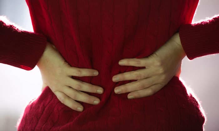 COVID-19 patients say Omicron back pain feels like period cramps, kidney stones, or muscle spasms