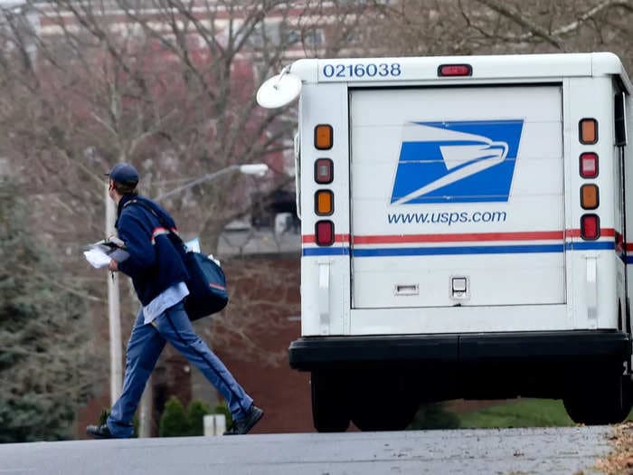 I'm a mailman for USPS who's delivered hundreds of COVID-19 tests in one day. Here's what the job is like right now.