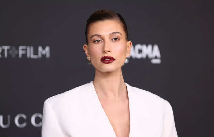 Hailey Bieber is 'home now and doing well' after she was hospitalized with a small blood clot on her brain