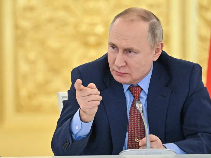 Putin says Russia must undergo a 'self-cleansing of society' to purge 'bastards and traitors' as thousands flee the country