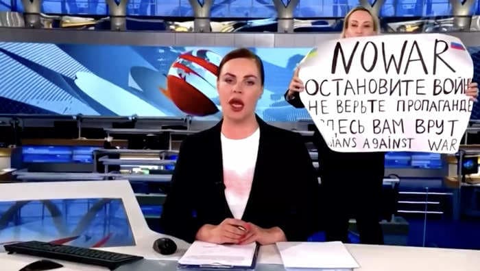 Russian journalist who stormed a live news broadcast with an anti-war sign says 'more than half of the people in Russia' oppose the war in Ukraine