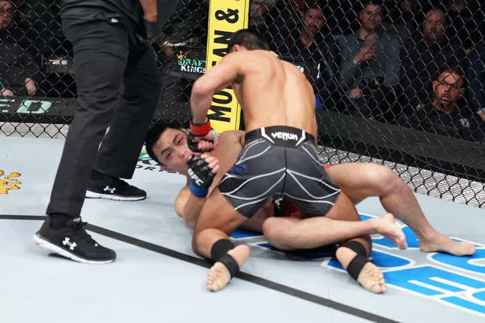 Chris Gutierrez seals a second-round knockout win with a spinning backfist at a UFC event