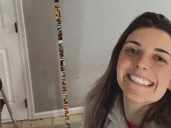A couple's $200 bet on creating a 10-foot tall Lego tower at home goes viral on TikTok