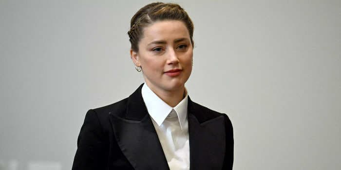 Amber Heard admitted to using mushrooms and MDMA while at home with a 'high-profile male acquaintance' just 2 weeks after her breakup fight with Johnny Depp, according to her former nurse