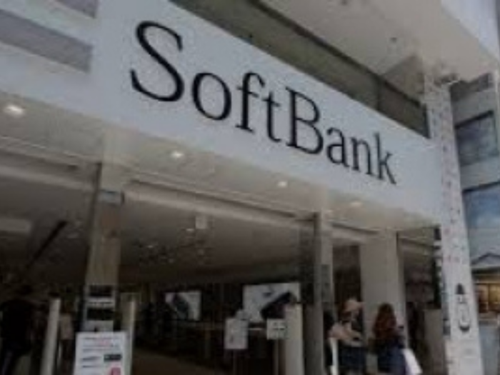 SoftBank would cut startup funding by half this year as losses cross $13 billion