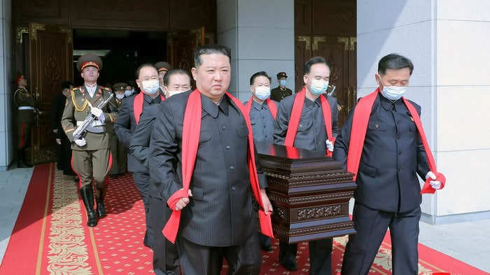 Kim Jong Un was seen not wearing a mask at a state funeral amid North Korea's severe Covid outbreak