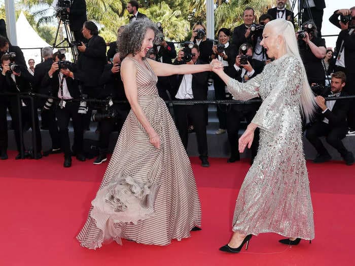 Photos show Andie MacDowell and Helen Mirren dancing with each other across the Cannes red carpet