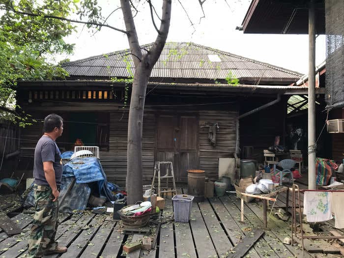 A couple bought 3 dilapidated floating homes on a Bangkok canal and turned them into a luxury waterside villa — take a look