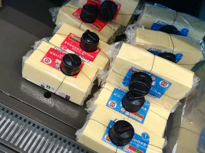 Discount grocer Aldi is securing $4.80 blocks of cheese in plastic security cages to deter shoplifting amid cost-of-living crisis