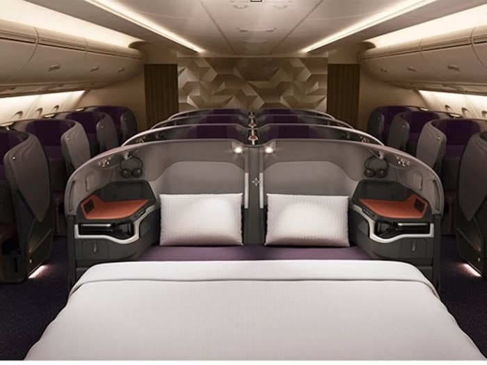 See inside Singapore's luxurious Airbus A380 business-class cabin that can convert two seats into a full bed