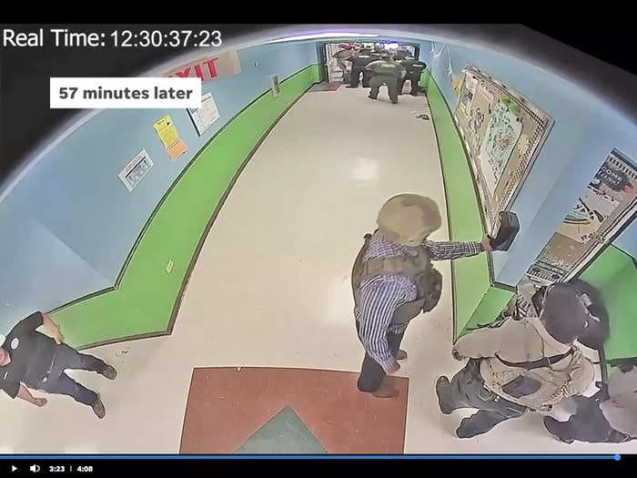 Leaked security video from inside Robb Elementary School shows police officers stopping for hand sanitizer and running away from the gunman